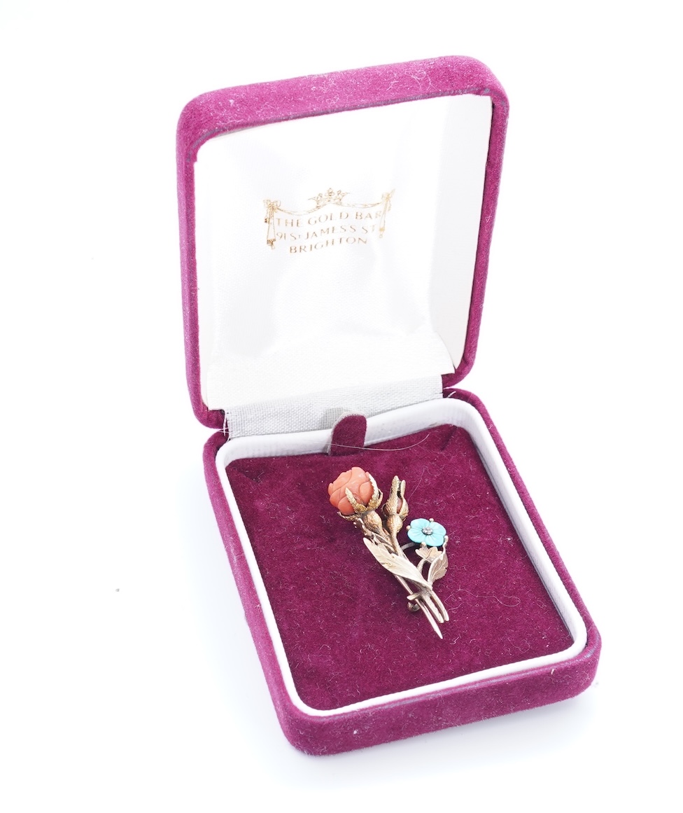 A gold, coral and turquoise brooch, circa 1840